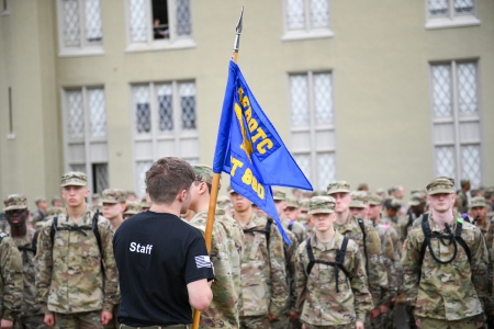 Air Force ROTC Detachment 880 cadet staff holds flag while organizing cadets preparing for the chance to commission into the United States Air Force.