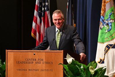 Gov. Terry McAuliffe speaks at a podium.