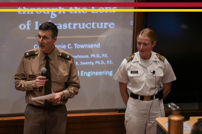 A VMI student and faculty member present research during Honors Week.