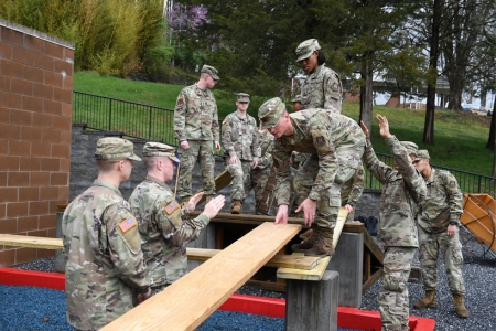 Air Force ROTC cadets work together on VMI leadership reaction course as part of their training to be able to commission into the United States Air Force.