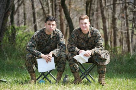 Two cadets pause during training as part of their mission to join the US Marine Corps through ROTC at VMI.
