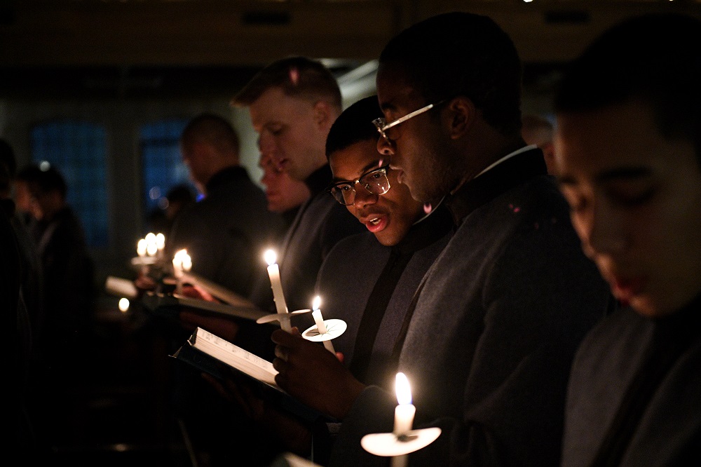 Cadets, students at VMI, gather in Memorial Hall for a candlelight service near the holidays.