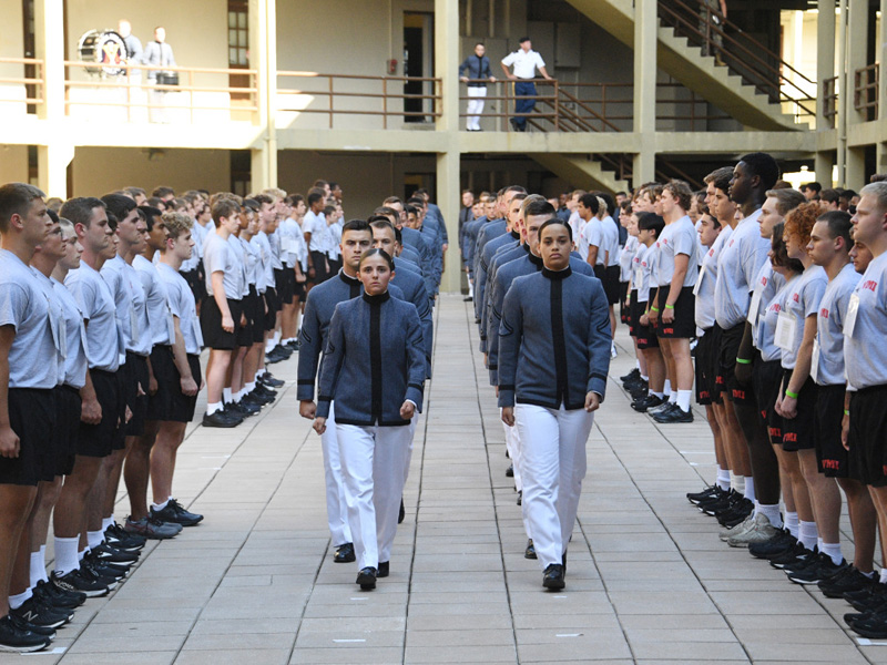 First year VMI cadets stand at attention to meet their cadre in barracks