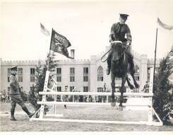Cavalry cadet going over jump