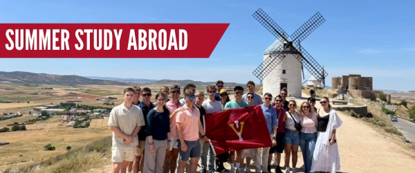 Summer Study Abroad text overlay of cadets in front of Spanish windmill.
