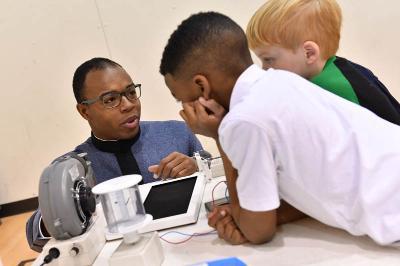 National Society of Black Engineers cadets visit Central Elementary School. 