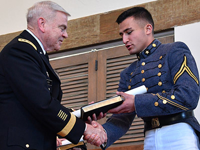 Richard Dow '18 crosses the stage today in the graduation ceremony held in Jackson Memorial Hall. Visit flickr.com/vmiphotos to see more images from December graduation. – VMI Photo by H. Lockwood McLaughlin.