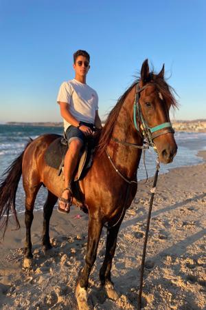 Antonio Ahanj ’24 horseback in Morocco. -Photo courtesy of Antonio Ahanj ’24.