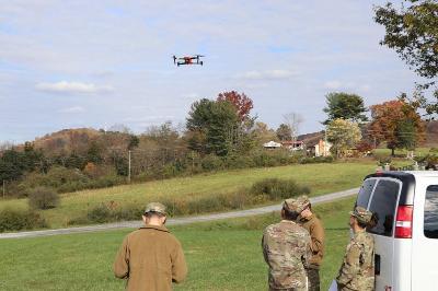 Cadets taking Civil Engineering 121 practice flying Unmanned Aerial Vehicles (UAVs or “drones”) used in surveying and mapping.