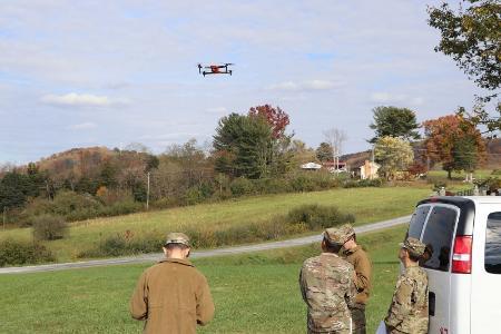 Cadets taking Civil Engineering 121  practice flying Unmanned Aerial Vehicles (UAVs or “drones”) used in surveying and mapping.