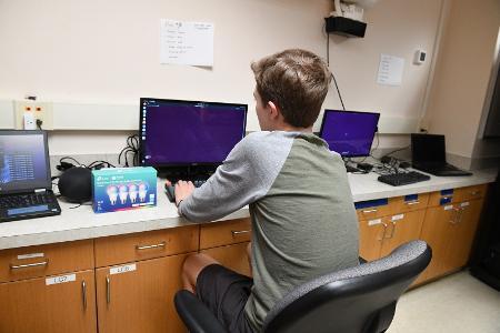 A homeschool student works on creating an app with VMI’s cyber defense internship program. -VMI Photo by Kelly Nye.