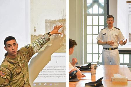 Jonathan Ballesteros-Novoa ’24 points to a photo of barracks from the late 1800s during his final Fieldwork presentation on May 3. Joshua Farr ’23 highlights the early years of VMI based on findings in archives on May 3.—VMI Photos by Kelly Nye.