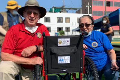Col. Woodson “Woody” A. Sadler Jr. '66 and wife Lori, during a wheelchair distribution in Ancon, Peru during spring furlough.—Photo by Woody” Sadler