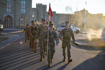 The members of the Rat Mass leave barracks early in the morning, each carrying school supplies that would be delivered to local elementary schools.—VMI Photo by Andrew Partridge ’24.