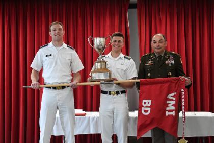 Col. Adrian T. Bogart III ’81, commandant of the Corps of Cadets presents the Garnett Andrews Cup to Band Company.