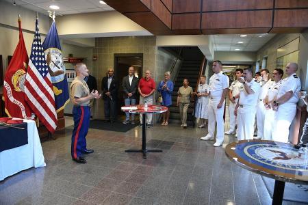 Col. Travis Homiak ’95 welcomes guests to the VMI NROTC 50th anniversary celebration.