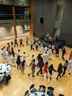 Participants of the parasitology meeting enjoy a high-spirited square dance to conclude the conference.