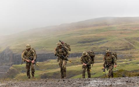 Army ROTC cadets from the Virginia Military Institute exit the CBRN stand at Exercise Cambrian Patrol on October 8, 2024, in Wales