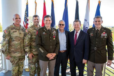 Members of the VMI Class of 1996 gather with Col. Michael Obadal to celebrate his retirement. Photo Courtesy of VMI Alumni Agencies.