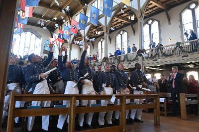 The graduates toss their gloves as they celebrate becoming VMI’s newest alumni. –VMI Photo by Kelly Nye.