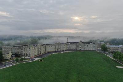 A foggy view of VMI's parade ground and barracks.