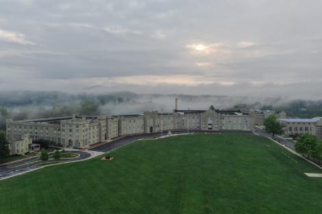 A foggy view of VMI's parade ground and barracks.