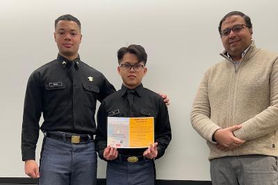 Benjamin Davis ’26 and Dang Khoa Le ’25 and Sherif Abdelhamid, Ph.D. display their Best Paper Award at the 15th IEEE Computing and Communication Workshop and Conference.