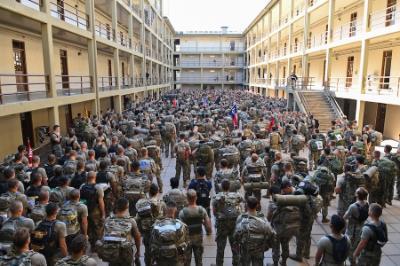 Cadets gather in New Barracks for speeches and a moment of silence before the stair climb.