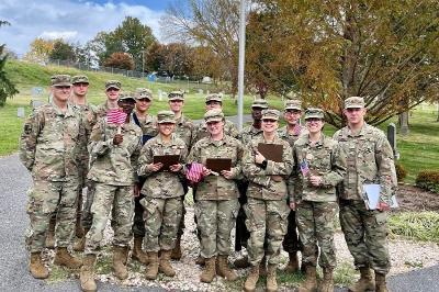 Col. Lawrence Havird ’90 and cadets prepare to identify the graves of veterans in Evergreen Cemetery in October. –Photo courtesy of Col. Valentina Dimitrova-Grajzl.