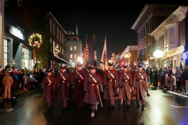 VMI Corps leaders march at the front as freshmen from the military college and the band participate in the Lexington Christmas Parade.