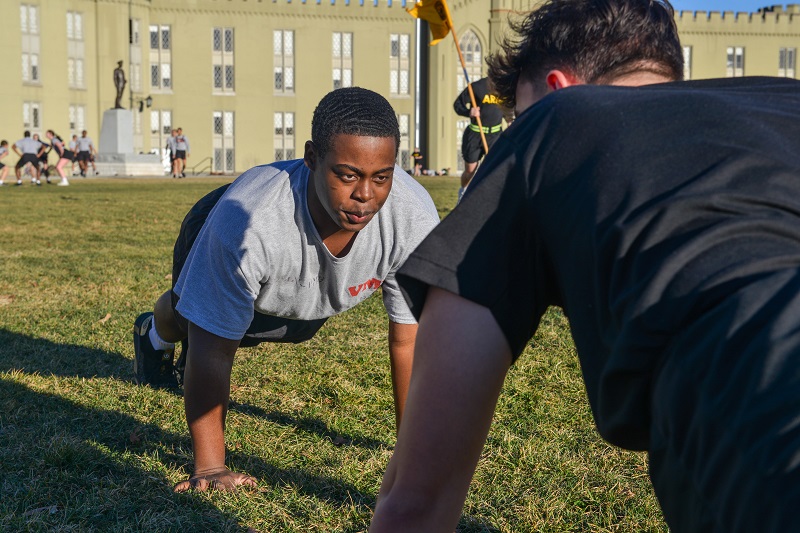 A VMI cadet and trainer complete push-ups during physical training exercises at this senior military college in Virginia.