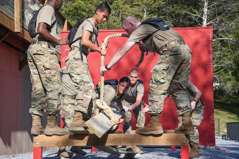 Freshmen, known as rats, work together on a leadership reaction course at VMI, a military college in Virginia.