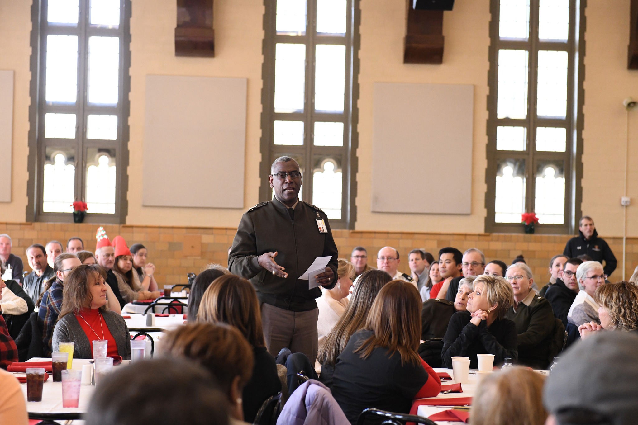 Maj. Gen. Cedric T. Wins '85, VMI superintendent, speaks to the VMI staff during a holiday gathering.