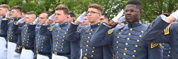 Graduating cadets at VMI salute.