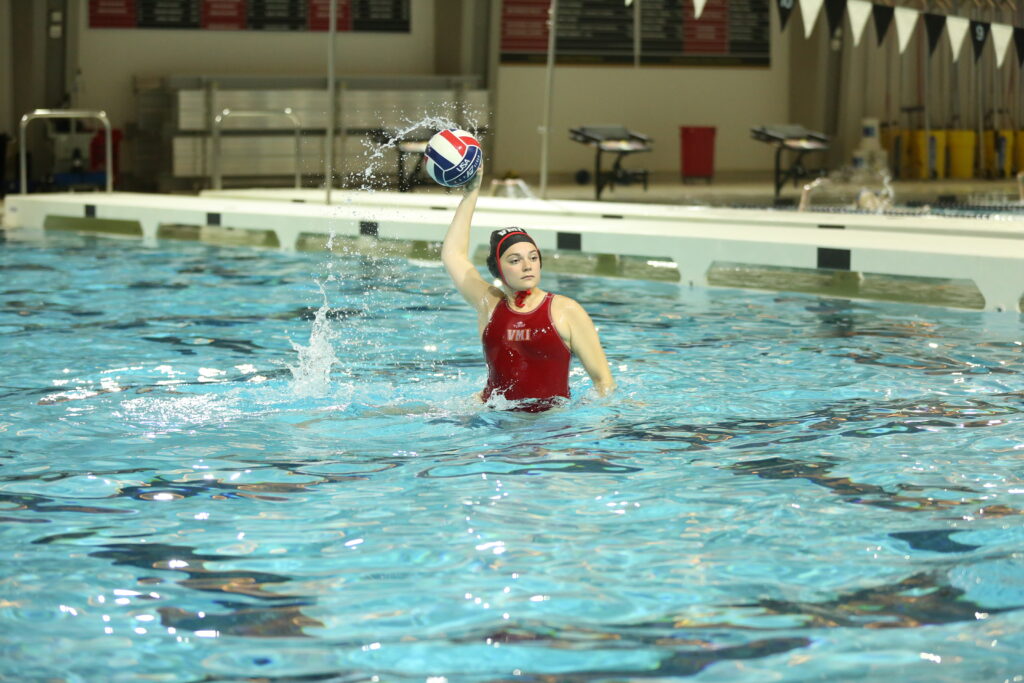 Sydney Smith in the pool playing water polo for Virginia Military Institute.
