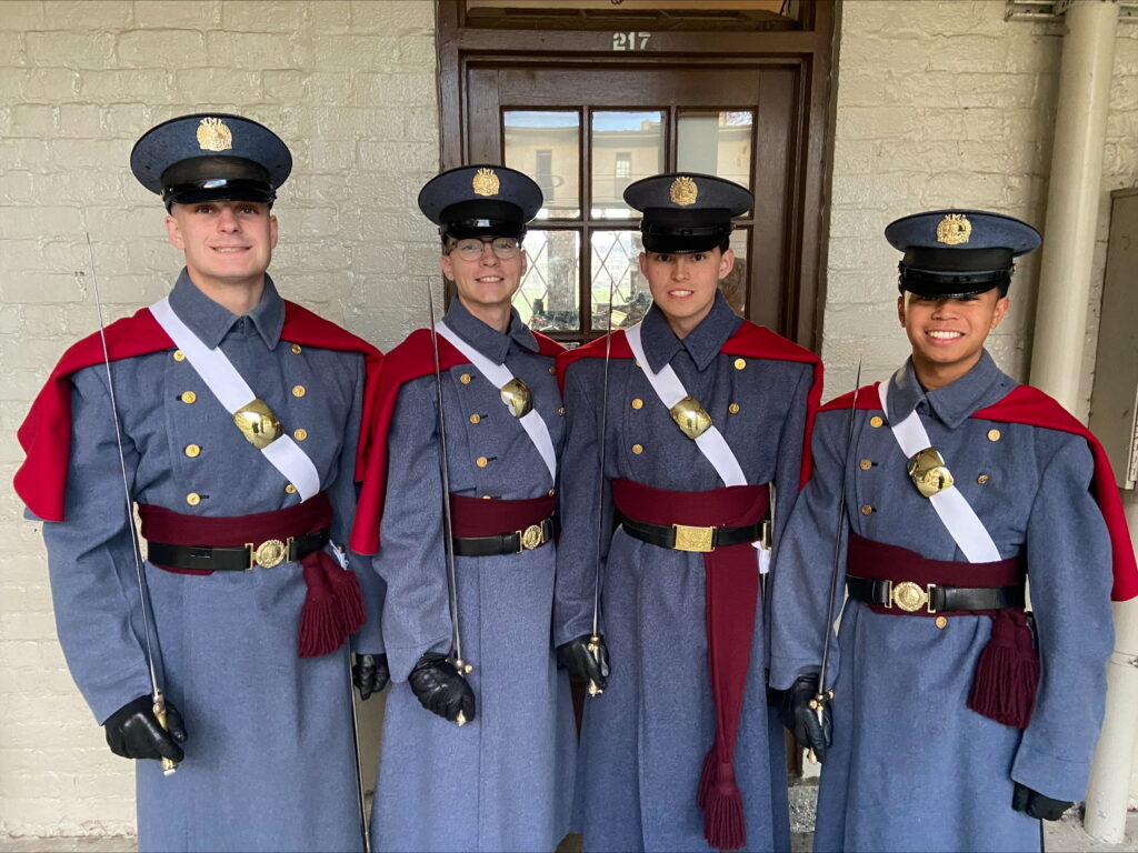 Matthew Atienza with his brother rats at Virginia Military Institute in barracks.