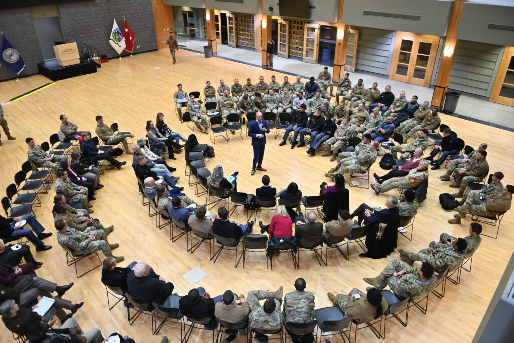 Cadets and community members attend a debate at VMI.