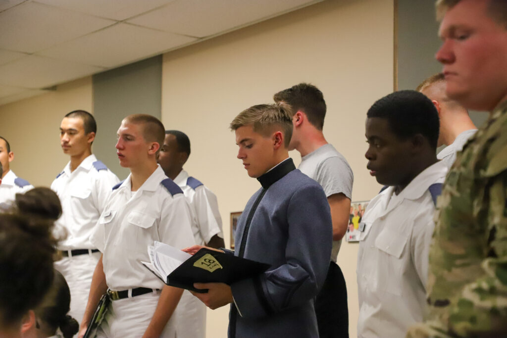 Cadets sing in the glee club.