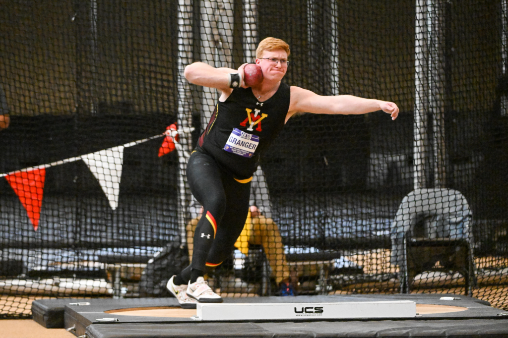 Andrew Granger preparing to throw the shot put during a track and field event for Virginia Military Institute.