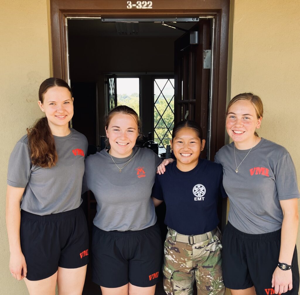 Sofia Fleming '28 with her brother rats outside of barracks at Virginia Military Institute.