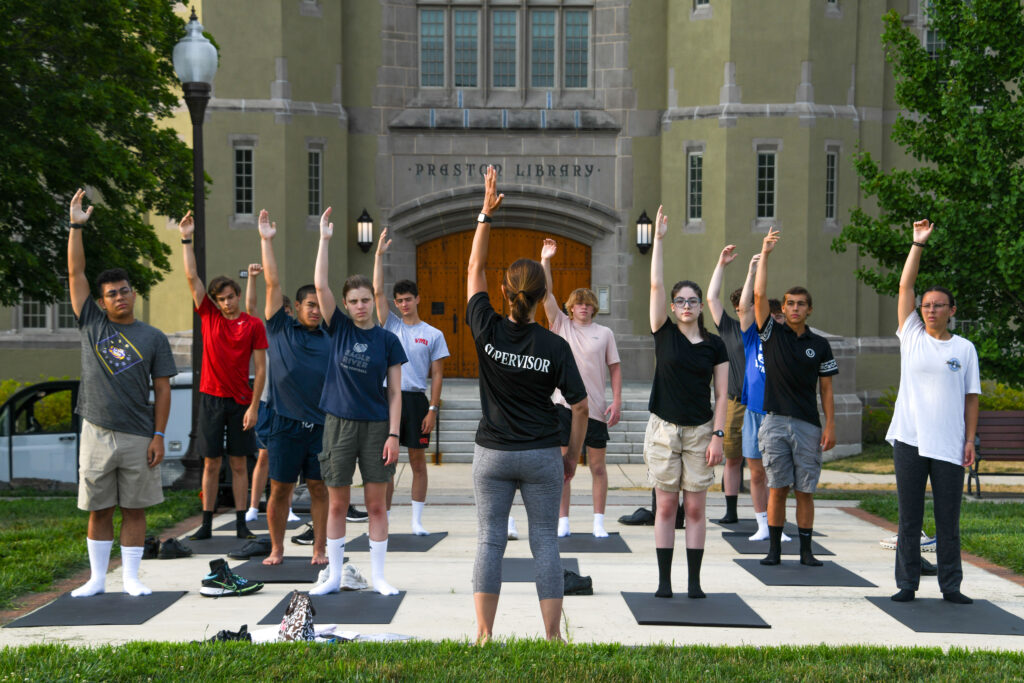 Cadets participate in a yoga class during the Summer Transition Program.