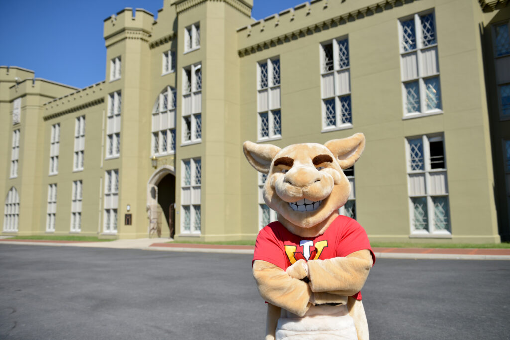 Moe, VMI's mascot, outside of barracks.