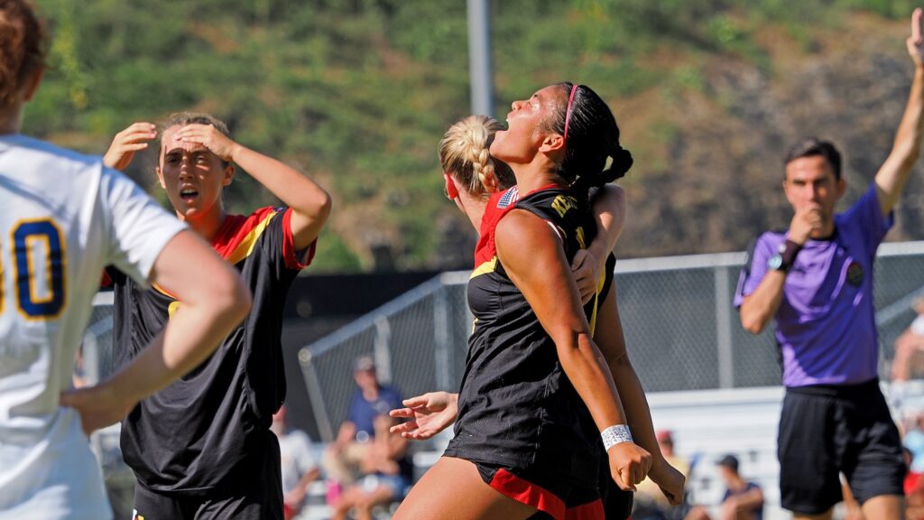 Barrett Callejo rejoicing on the soccer field while playing for Virginia Military Institute. 