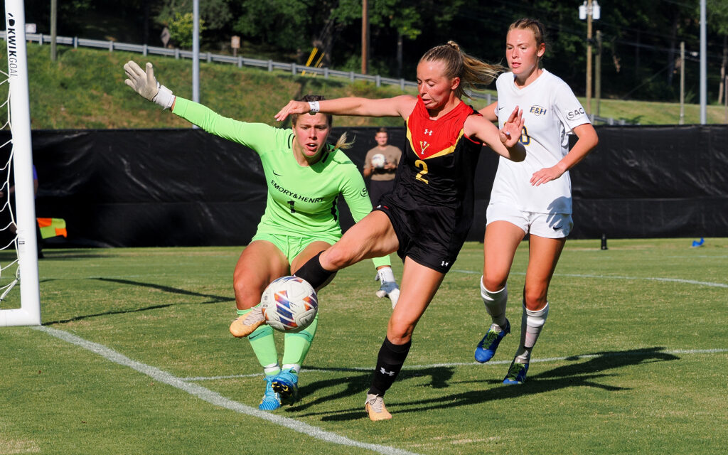 Sedona Dancu kicks the soccer ball at a Virginia Military Institute women's soccer game.