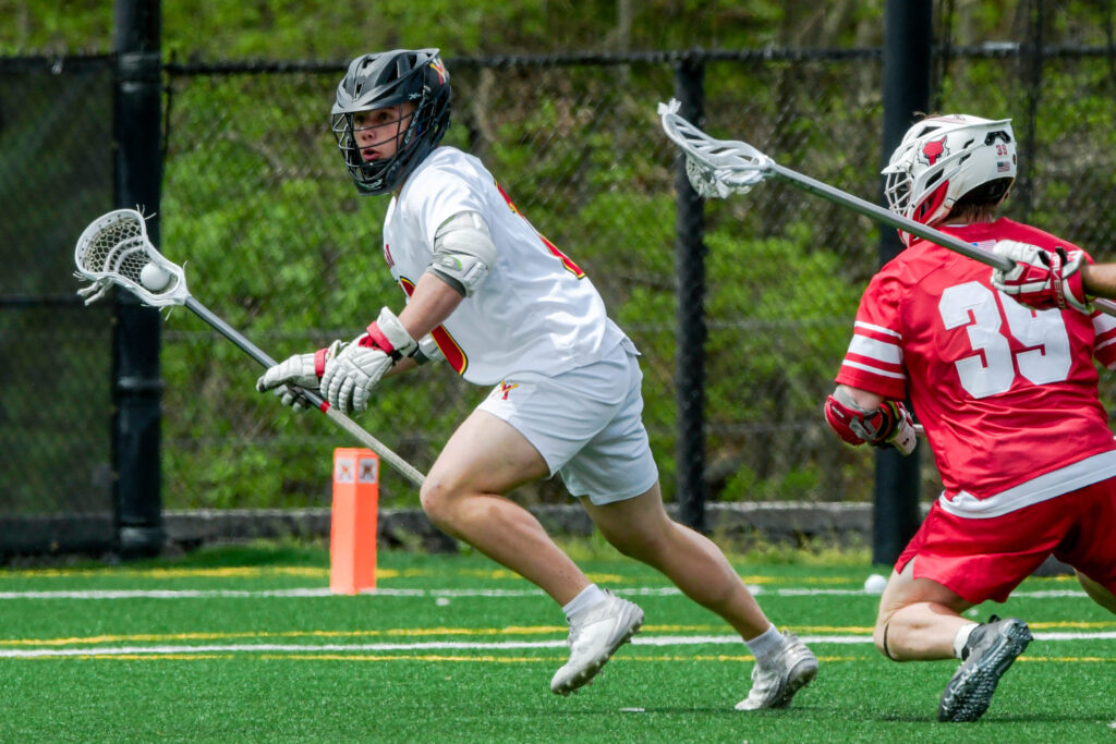 Cole Jones playing lacrosse for Virginia Military Institute.
