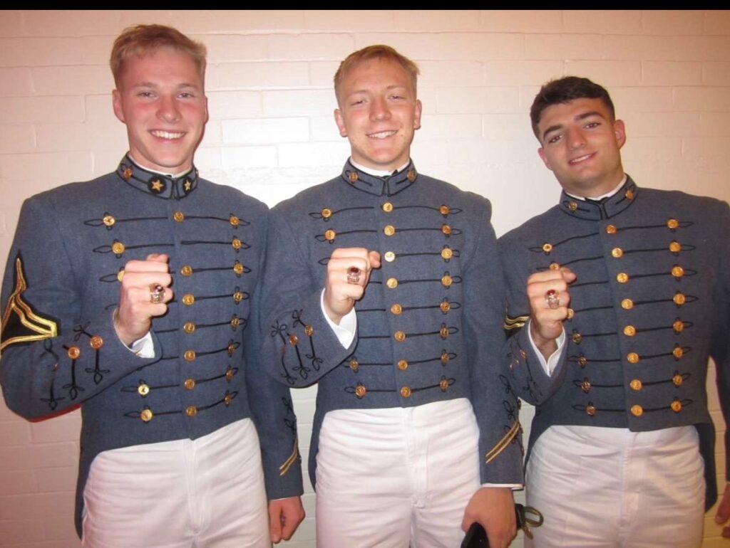 Ryan Halverson showing off his Virginia Military Institute ring with his brother rats.