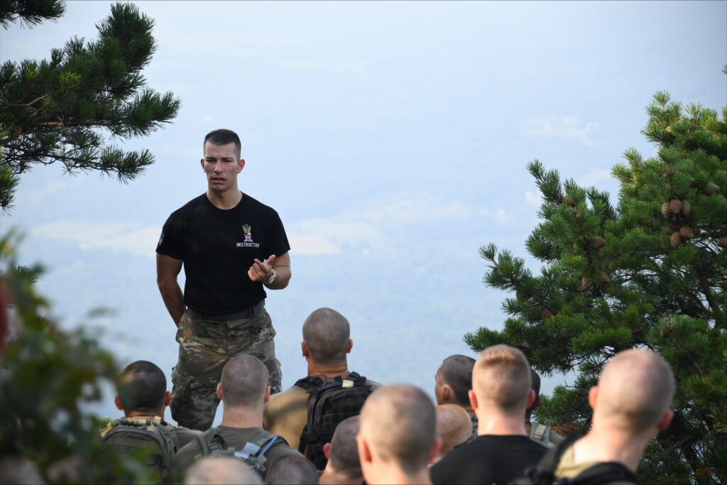 Sebastian Ramirez addresses the Corps of Cadets atop a mountain.