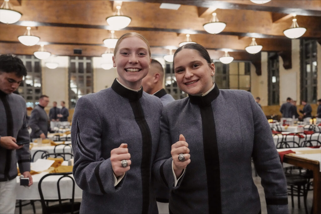 Gracie Harlow with her brother rat in the dining hall.