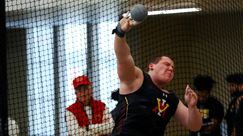 Tazewell Rae shoots the shot put during a track and field event at Virginia Military Institute.