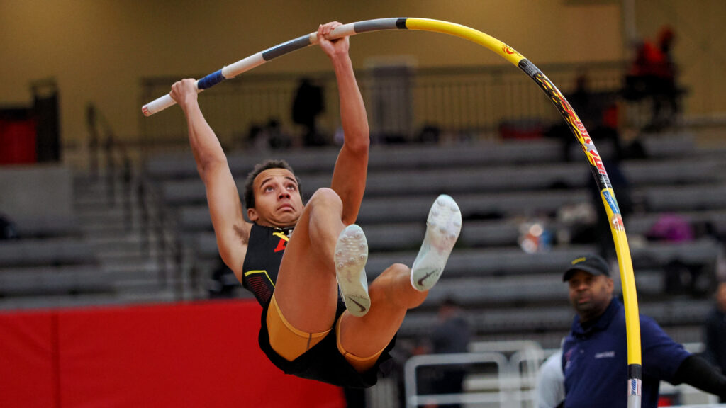 Cameron Thomas pole vaulting during a track and field meet for Virginia Military Institute. 
